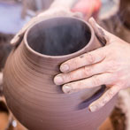 Doug Fitch and Hannah McAndrew making a jug for me